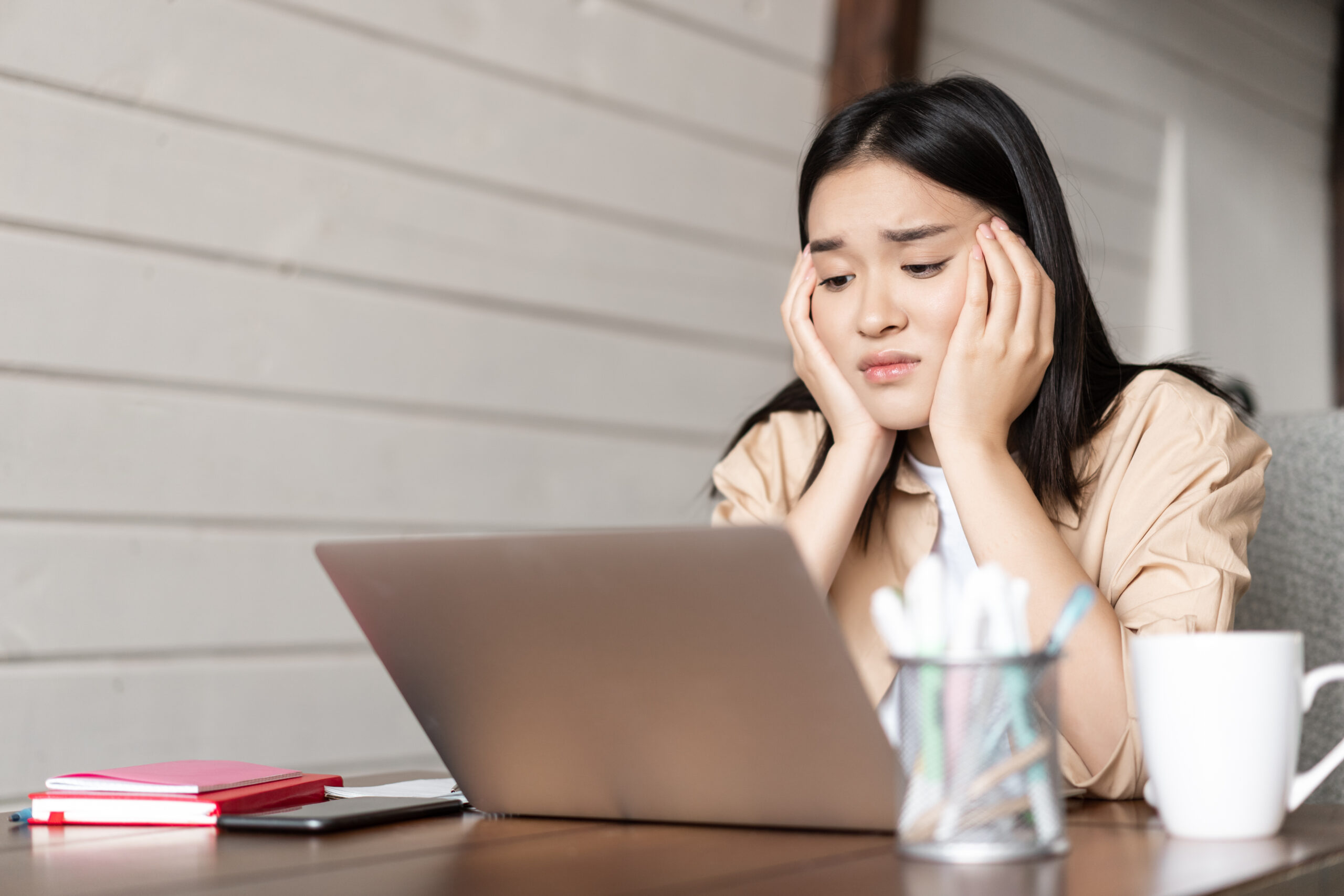 sad-bored-young-asian-girl-student-studying-looking-upset-laptop-screen-attend-boring-online.jpg